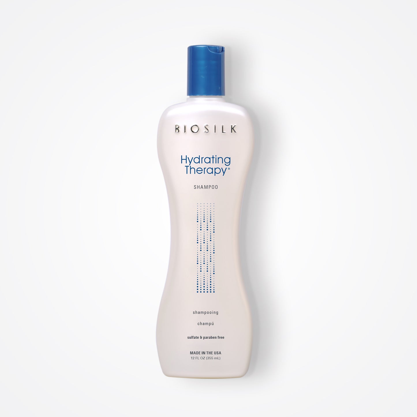 BioSilk Hydrating Therapy Shampoo 12oz in a white bottle with a blue top and has blue script at the top "Hydrating Therapy" and below "shampoo"