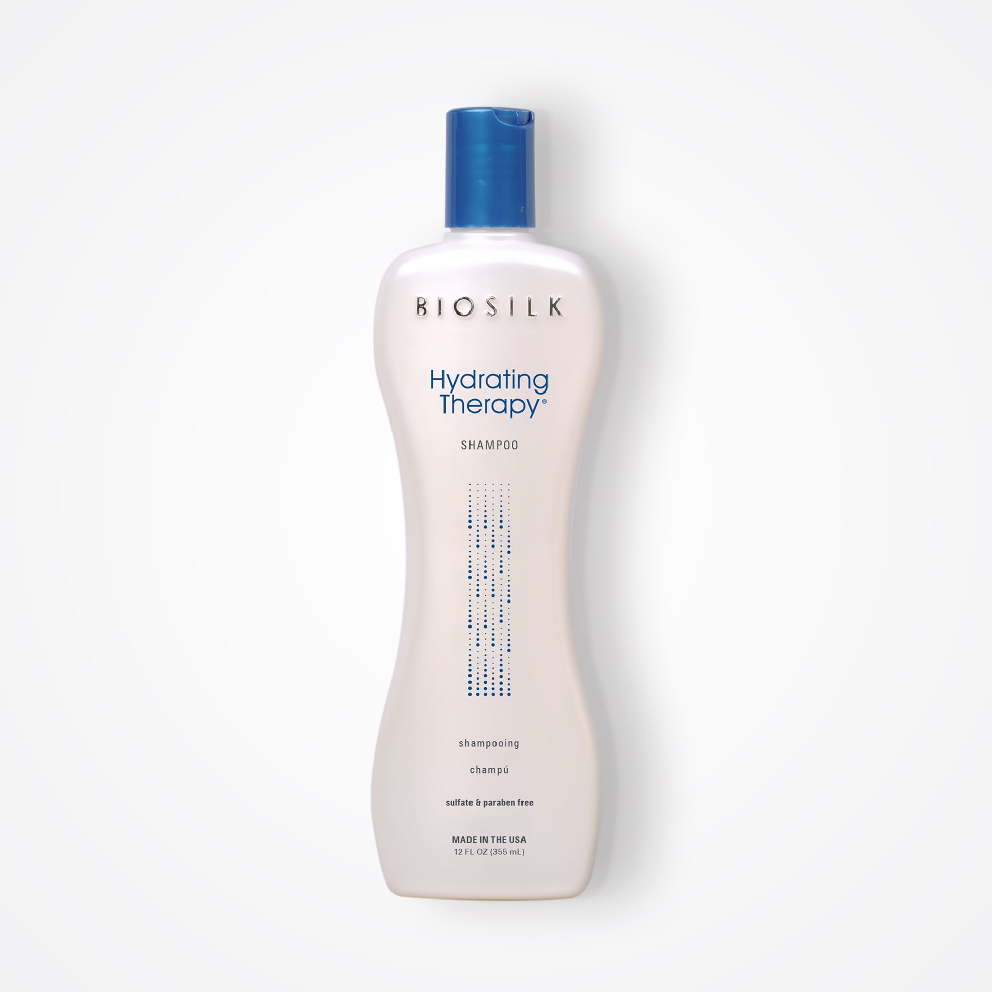 BioSilk Hydrating Therapy Shampoo 12oz in a white bottle with a blue top and has blue script at the top "Hydrating Therapy" and below "shampoo"