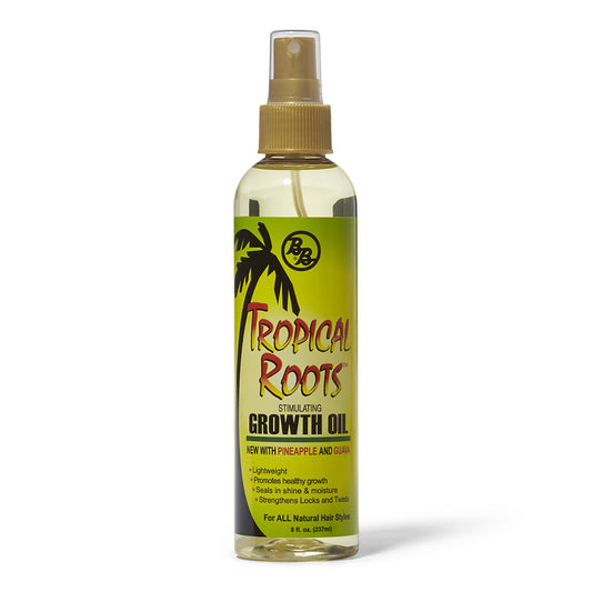 B&B Tropical Roots Growth Oil in a clear spray bottle with a green and yellow label