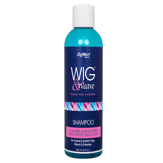 DeMert Wig and Weave Shampoo in a clear bottle with blue liquid and a blue label featuring pink and white lettering