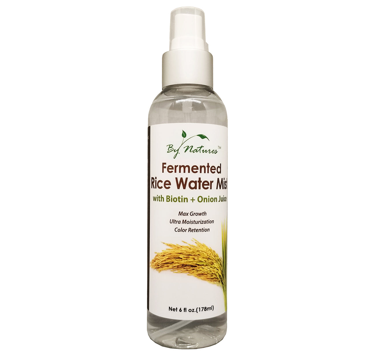 By Natures Fermented Rice Water Mist in a clear spray bottle with clear liquid, white cap, and rice label for hair and skin
